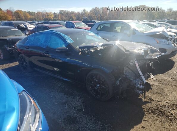 WBAGV8C01NCJ71188 2022 BMW M8 Черный Передняя правая четверть