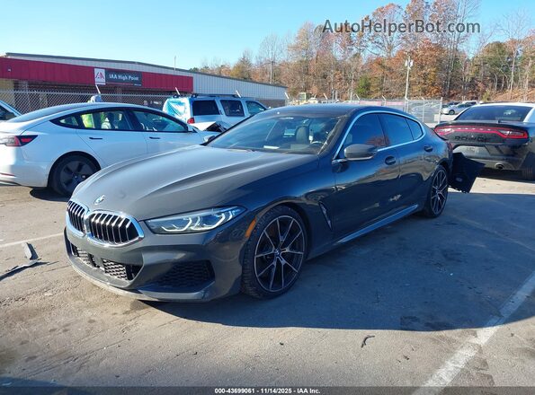 WBAGV8C03MCF82920 2021 BMW M8 Gray Առջևի ձախ երեք քառորդ տեսարան
