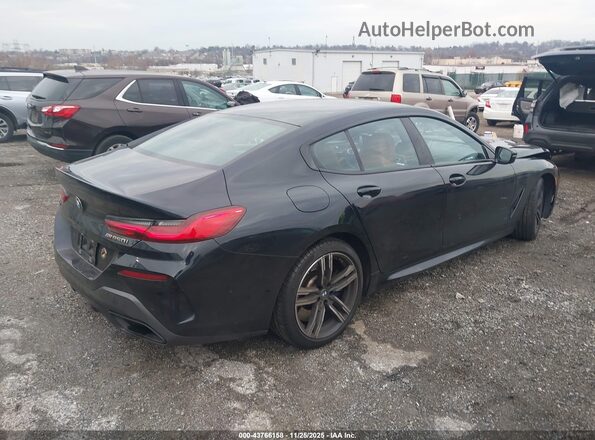 WBAGV8C05NCG97441 2022 BMW M8 Black Tył prawy