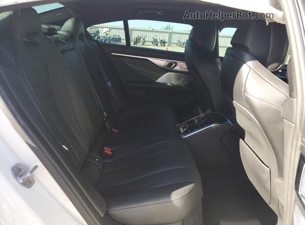 WBAGV8C07MCF01983 2021 BMW M8 White Rear seats view