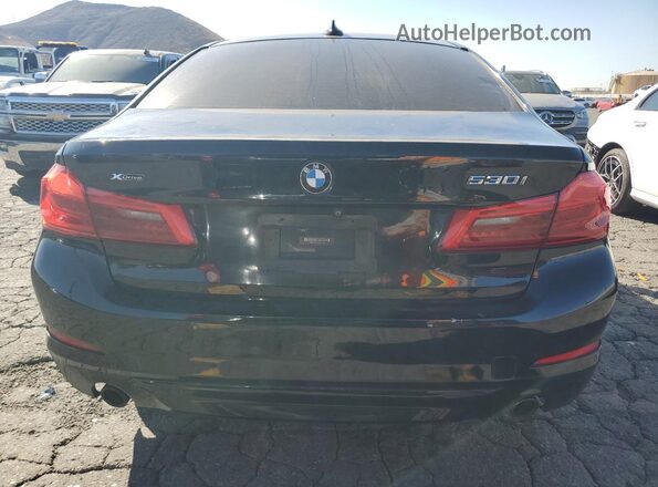 WBAJR7C05LWW65182 2020 BMW 5 SERIES Черный Вид сзади
