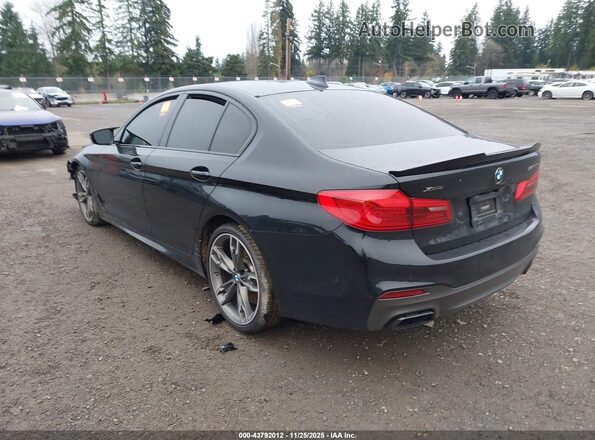 WBAJS7C09LCD47686 2020 BMW 5 SERIES Black Tył lewy