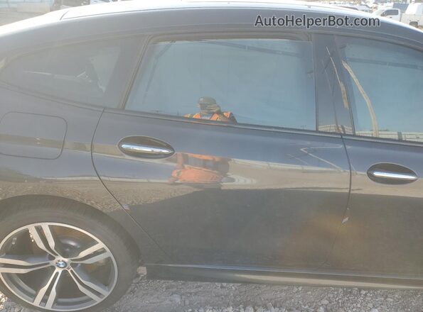 WBAJV6C55JBK07681 2018 BMW 6 SERIES Black Vista de los asientos traseros