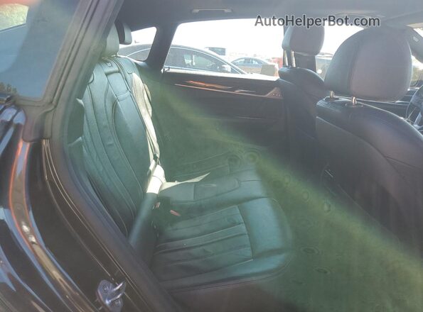 WBAJV6C5XJBK07711 2018 BMW 6 SERIES Black Vista de los asientos traseros