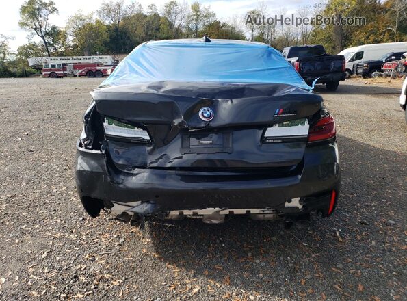 WBS83CH00PCL23031 2023 BMW M5 Black Widok z tyłu