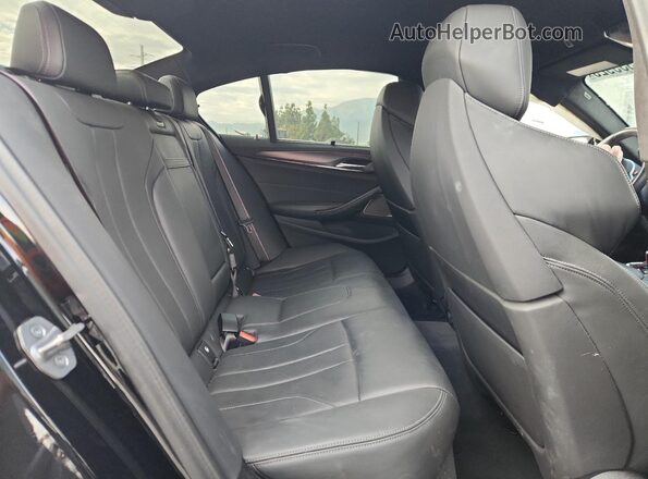 WBS83CH08PCL28431 2023 BMW M5 Black Հետևի նստատեղերի տեսք
