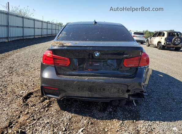 WBS8M9C54J5L00799 2018 BMW M3 Black Rear view