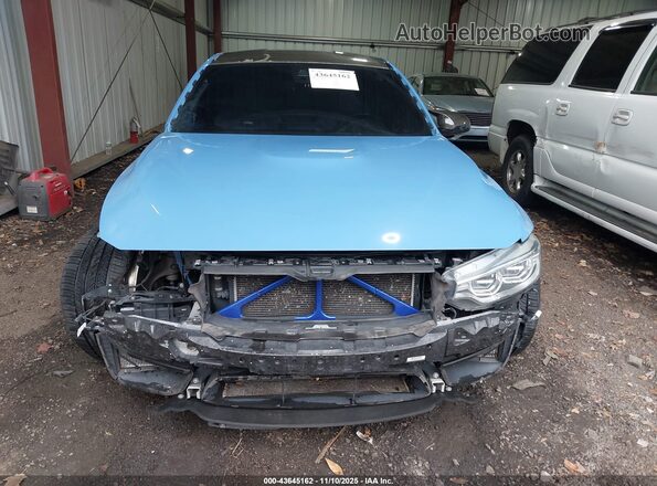 WBS8M9C57GP966780 2016 BMW M3 Blue Widok wnętrza z tyłu