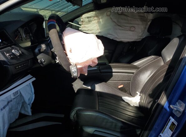 WBSFV9C50GD595449 2016 BMW M5 Blue Front interior view