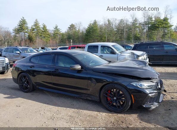 WBSGV0C0XMCF94348 2021 BMW M8 Black Սալոնի հետևի տեսք