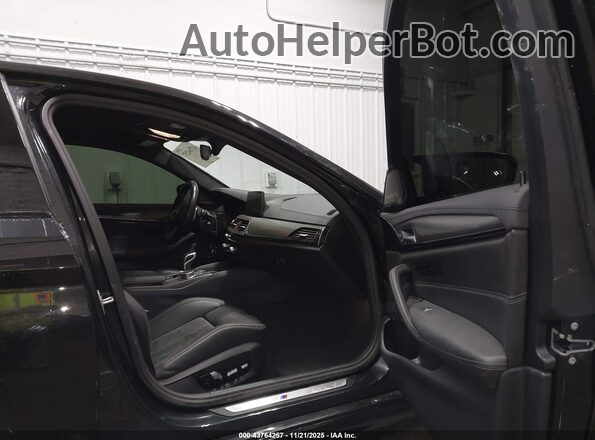 WBSJF0C04LCD69571 2020 BMW M5 Maroon Front interior view