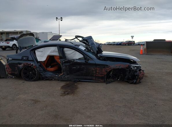 WBSJF0C52KB447858 2019 BMW M5 Black Սալոնի հետևի տեսք