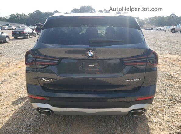 WBX47DP03NN165368 2022 BMW X3 Black Vista trasera