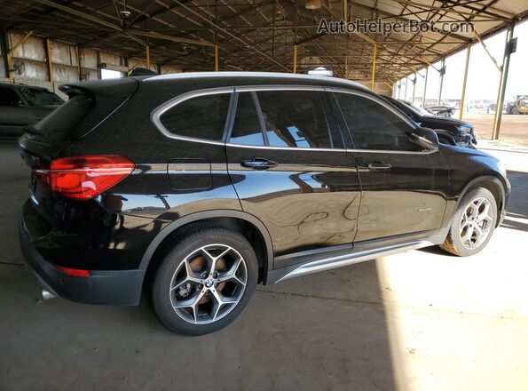 WBXHT3C31H5F73351 2017 BMW X1 Black Trasero derecho
