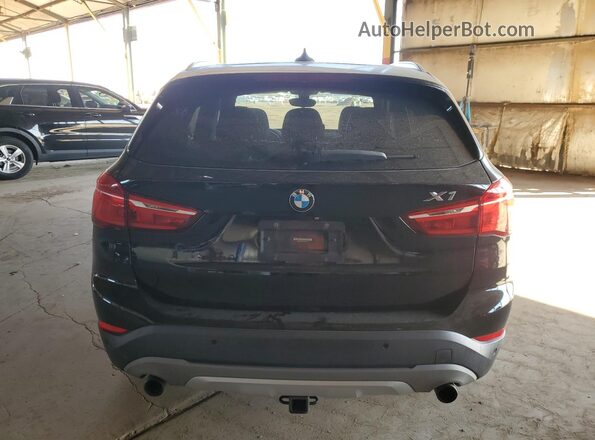 WBXHT3C31H5F73351 2017 BMW X1 Black Vista trasera