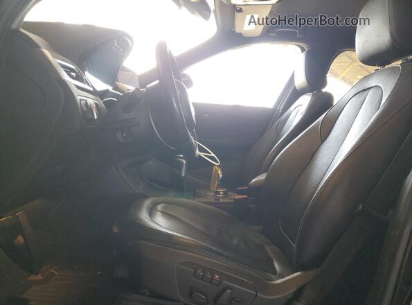 WBXHT3C31H5F73351 2017 BMW X1 Black Vista interior delantera