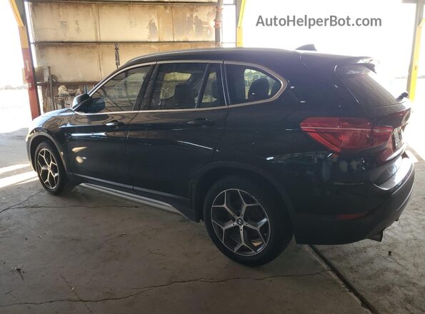 WBXHT3C31H5F73351 2017 BMW X1 Black Trasero izquierdo