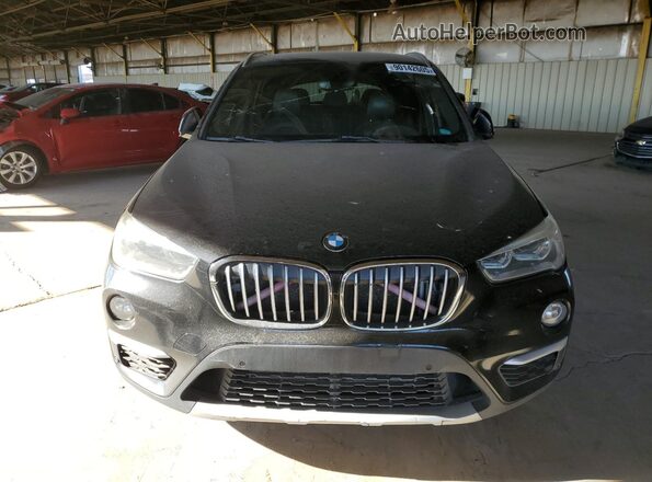 WBXHT3C31H5F73351 2017 BMW X1 Black Vista frontal