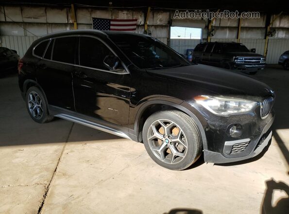 WBXHT3C31H5F73351 2017 BMW X1 Black Delantero derecho