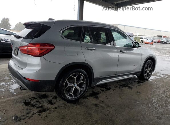 WBXHT3C36GP881258 2016 BMW X1 Silver Trasero derecho