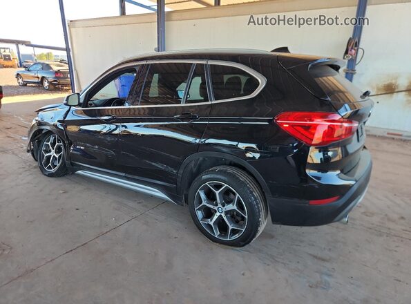 WBXHT3C38J5L24533 2018 BMW X1 Black Rear left