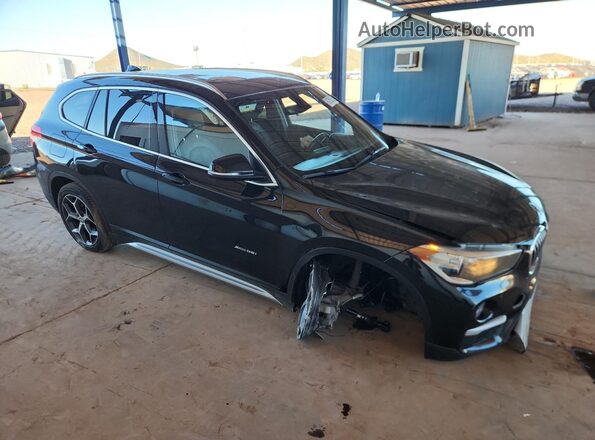 WBXHT3C38J5L24533 2018 BMW X1 Black Front right