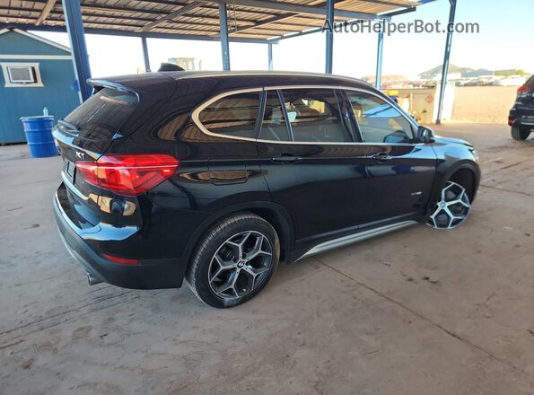 WBXHT3C38J5L24533 2018 BMW X1 Black Rear right