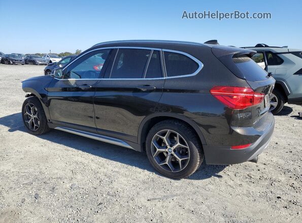 WBXHT3C50K5L89587 2019 BMW X1 Black Trasero izquierdo