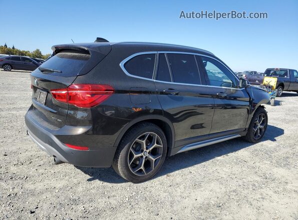 WBXHT3C50K5L89587 2019 BMW X1 Black Trasero derecho