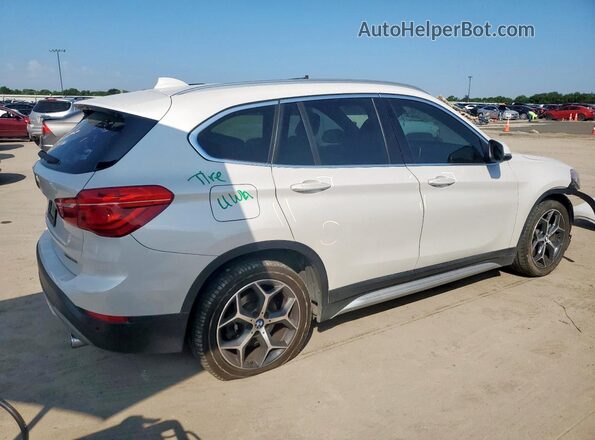 WBXHT3C51K5L38194 2019 BMW X1 White Trasero derecho