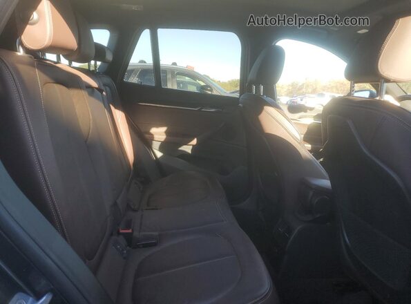 WBXHT3C56K5L97855 2019 BMW X1 Charcoal Вид задніх сидінь