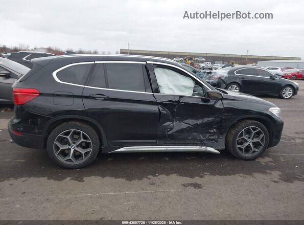 WBXHT3C59K5L35558 2019 BMW X1 Black უკანა სალონის ხედი