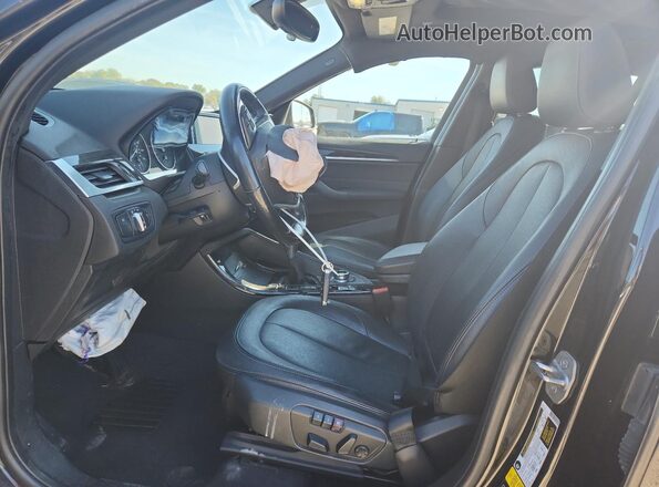 WBXHT3Z33G4A50280 2016 BMW X1 Black Vista interior delantera