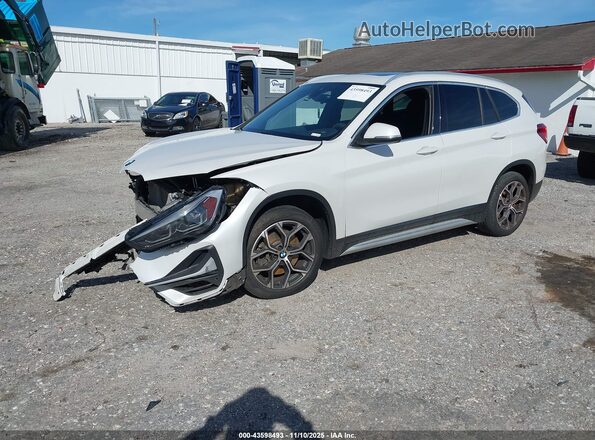 WBXJG7C01L5P46388 2020 BMW X1 White Front left