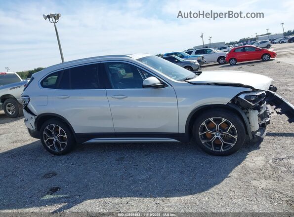 WBXJG7C01L5P46388 2020 BMW X1 White 360 interior view