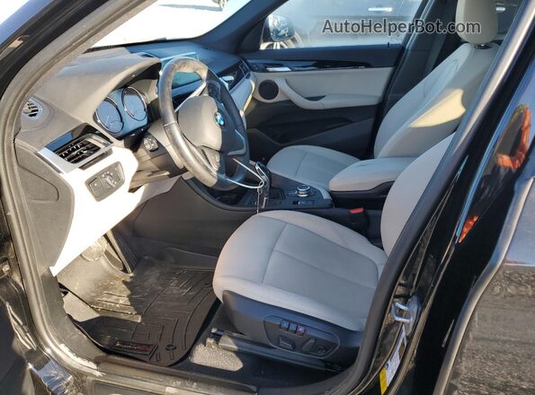WBXJG7C01L5R53881 2020 BMW X1 Black Front interior view
