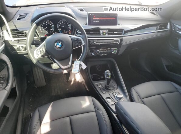 WBXJG7C01L5R90428 2020 BMW X1 Blue Dashboard view