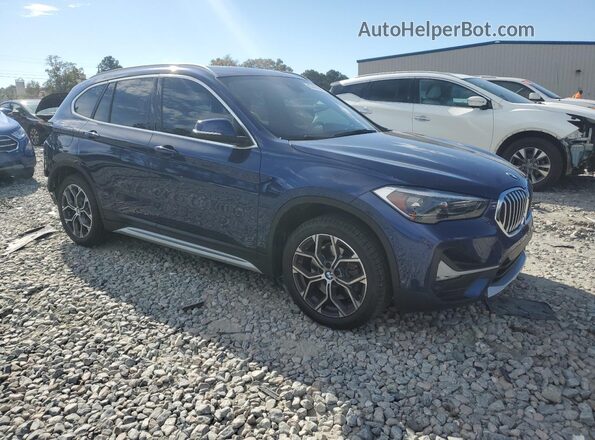 WBXJG7C01L5R90428 2020 BMW X1 Blue Front right