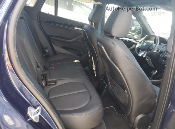 WBXJG7C01L5R90428 2020 BMW X1 Blue Rear interior view