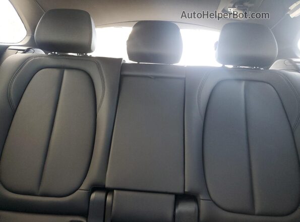 WBXJG7C01L5R90428 2020 BMW X1 Blue Rear seats view