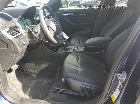 WBXJG7C01L5R90428 2020 BMW X1 Blue Front interior view