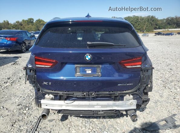 WBXJG7C01L5R90428 2020 BMW X1 Blue Rear view