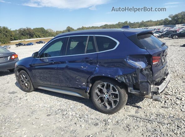 WBXJG7C01L5R90428 2020 BMW X1 Blue Rear left