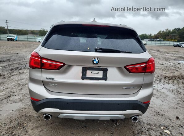 WBXJG7C01N5V09659 2022 BMW X1 Tan Widok z tyłu