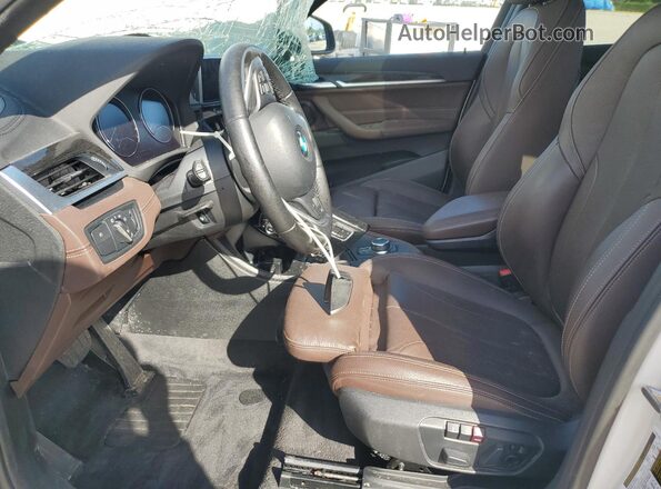 WBXJG7C05L5P30307 2020 BMW X1 White Front interior view