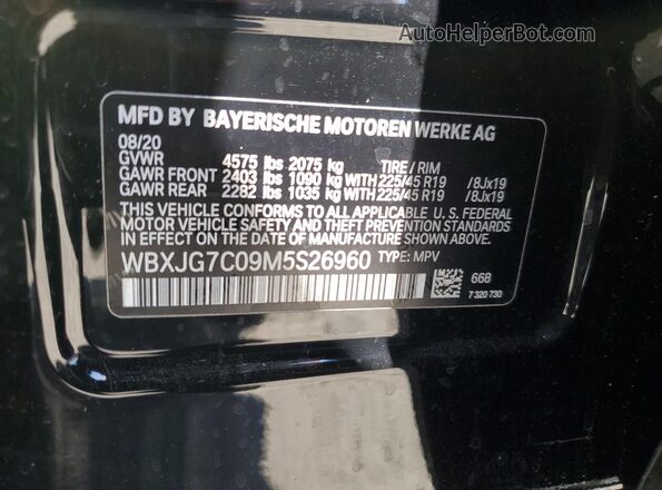 WBXJG7C09M5S26960 2021 BMW X1 Black VIN კოდის სტიკერის ხედი