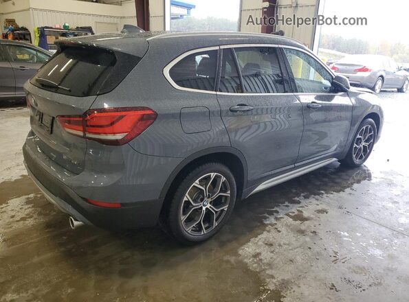 WBXJG9C03L5P84989 2020 BMW X1 Blue Trasero derecho