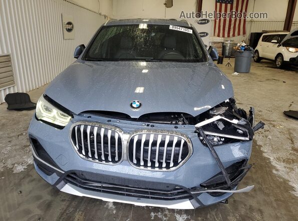 WBXJG9C03L5P84989 2020 BMW X1 Blue Vista frontal