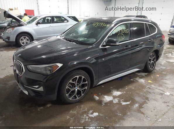 WBXJG9C08M5S76583 2021 BMW X1 Black Առջևի ձախ երեք քառորդ տեսարան
