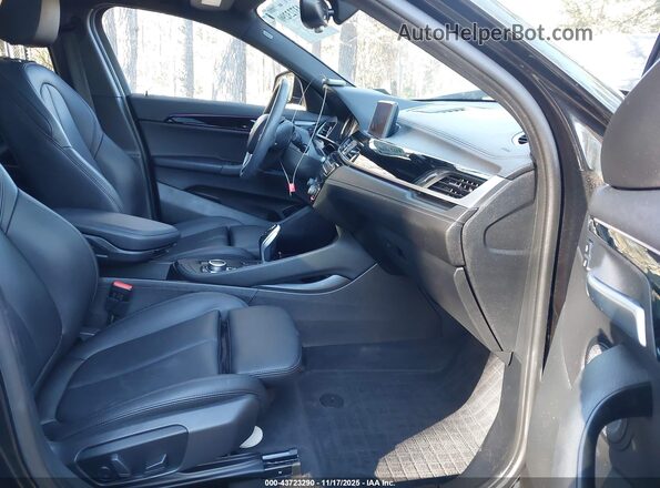 WBXYH9C02L5P44673 2020 BMW X2 Black Widok wnętrza z przodu